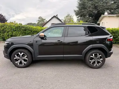 Dacia Duster HEV 140 Extreme — SUV hybride économique, 25 600 km, full équipé — Heckansicht
