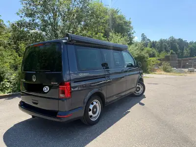 VW T6.1 California Ocean Liberty — Camping-car 4Motion, entretien complet inclus — Heckansicht