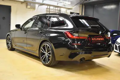 BMW 320d xDrive Touring M Sport — Berline familiale diesel, équipement haut de gamme et service gratuit — rear view
