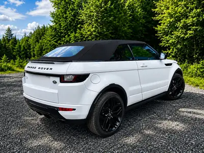 Land Rover Range Rover Evoque 2.0 Si4 SE Dynamic — Cabriolet luxe 4x4, design premium — côté