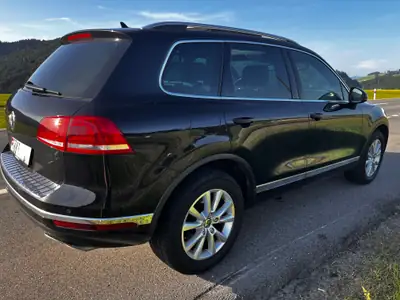 VW Touareg 3.0 V6 TDI — SUV premium diesel, entretien optimal à 141'500 km — rear view