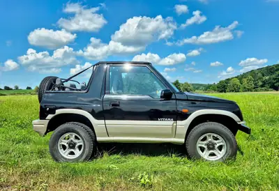 Suzuki Vitara 1.6 Cabriolet 1999 — Petit SUV découvrable, parfait pour l'été — Miniatur 13