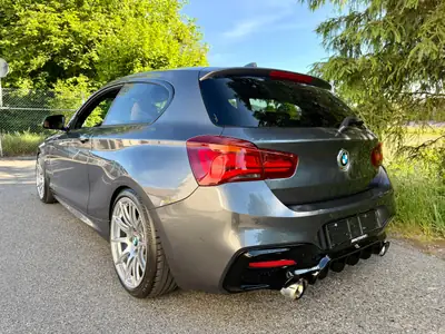 BMW M140i — Rare configuration manuelle, 340 ch de performance pure — fianco