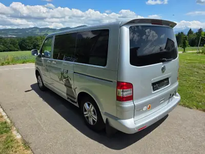 VW T5 Highline — Utilitaire premium diesel, spacieux et fiable — vista esterna