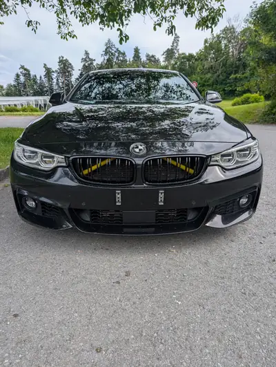 BMW 435i xDrive Coupé 2013 — Sportivité all-wheel drive et design premium — côté