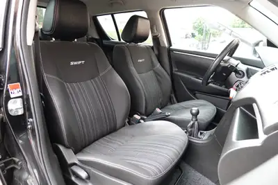 Suzuki Swift 1.2i 16V GL — Citadine robuste 4x4, sièges chauffants et moteur économe — Miniature 21
