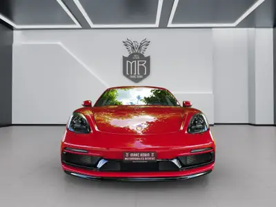 Porsche 718 Cayman GTS 4.0 PDK — Coupé sportif 400 ch, première main suisse — side view