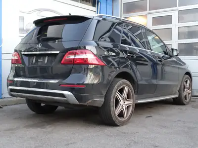 Mercedes-Benz ML 350 BlueTEC — SUV premium diesel 4x4, entretien châssis premium — rear view