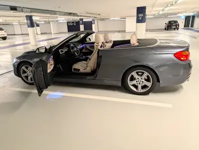 BMW 430i Cabriolet — Décapotable élégante, 252 ch dynamiques et équipements premium — vista posteriore