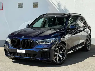 BMW X5 xDrive45e — SUV plug-in hybride premium, 59 400 km, entretien BMW gratuit inclus — rear view