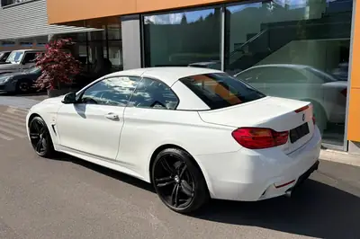 BMW 435i xDrive Cabrio — Roadster haute performance, moteur 306 ch et toit électrique — rear view