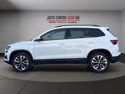 Skoda Karoq 2.0 TDI 150 ch — SUV 4×4 fiable, entretien complet, sans accident — rear view