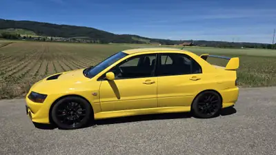 Mitsubishi Lancer Evolution VIII 2.0 T — Légende sportive iconique, historique complet depuis 2009 — vue extérieure