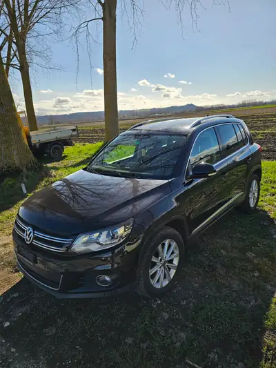VW Tiguan 2.0 TDI 177 ch — SUV robuste, intérieur premium noir, transmission manuelle — vue extérieure