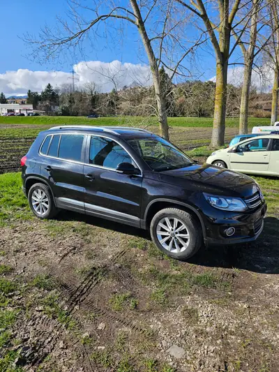 VW Tiguan 2.0 TDI 177 ch — SUV robuste, intérieur premium noir, transmission manuelle — côté
