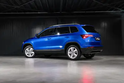 Skoda Karoq 1.5 TSI Top Selection — SUV compact robuste, garantie 5 ans usine — côté