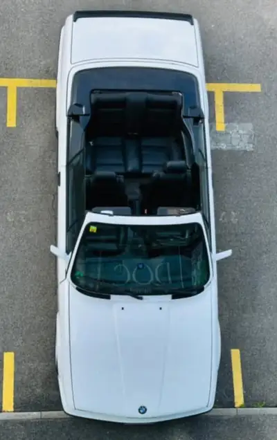 BMW 325i Cabriolet E30 — L'icône décapotable des années 90, 170 ch authentiques — côté