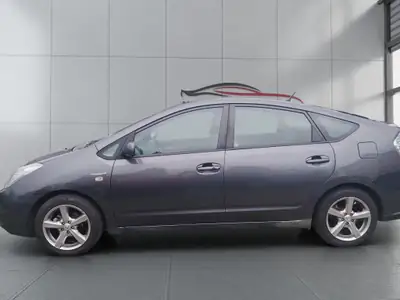 Toyota Prius 1.5 Hybrid — Pionnière écologique, entretien exemplaire — Thumbnail 8