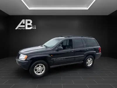 Jeep Grand Cherokee 4.7 Limited — SUV robuste, transmission automatique, tous terrains — fianco