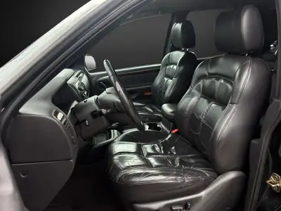Jeep Grand Cherokee 4.7 Limited — SUV robuste, transmission automatique, tous terrains — Miniatura 7