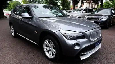 BMW X1 xDrive 28i Steptronic — SUV compact allemand, 4x4 performant et fiable — côté