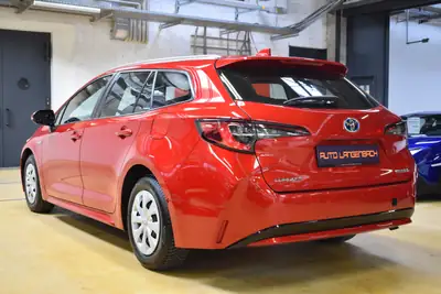 Toyota Corolla Touring Sports 1.8 HSD — Monospace hybride économe, 89 000 km seulement — Heckansicht