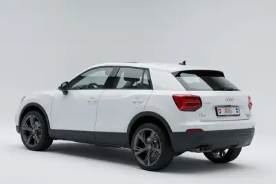 Audi Q2 35 TDI quattro S-tronic — SUV compact diesel performant, entretien économique — rear view