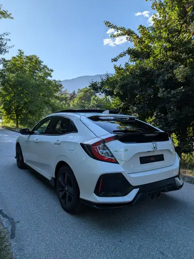 Honda Civic 1.5 Sport Plus Turbo VTEC — Berline sportive 182ch, révisions complètes 2026 — Seitenansicht