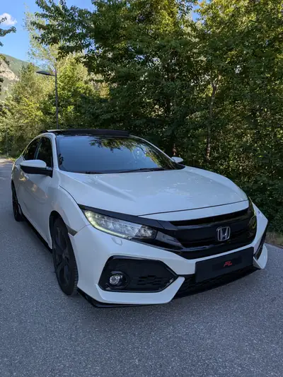 Honda Civic 1.5 Sport Plus Turbo VTEC — Berline sportive 182ch, révisions complètes 2026 — Außenansicht