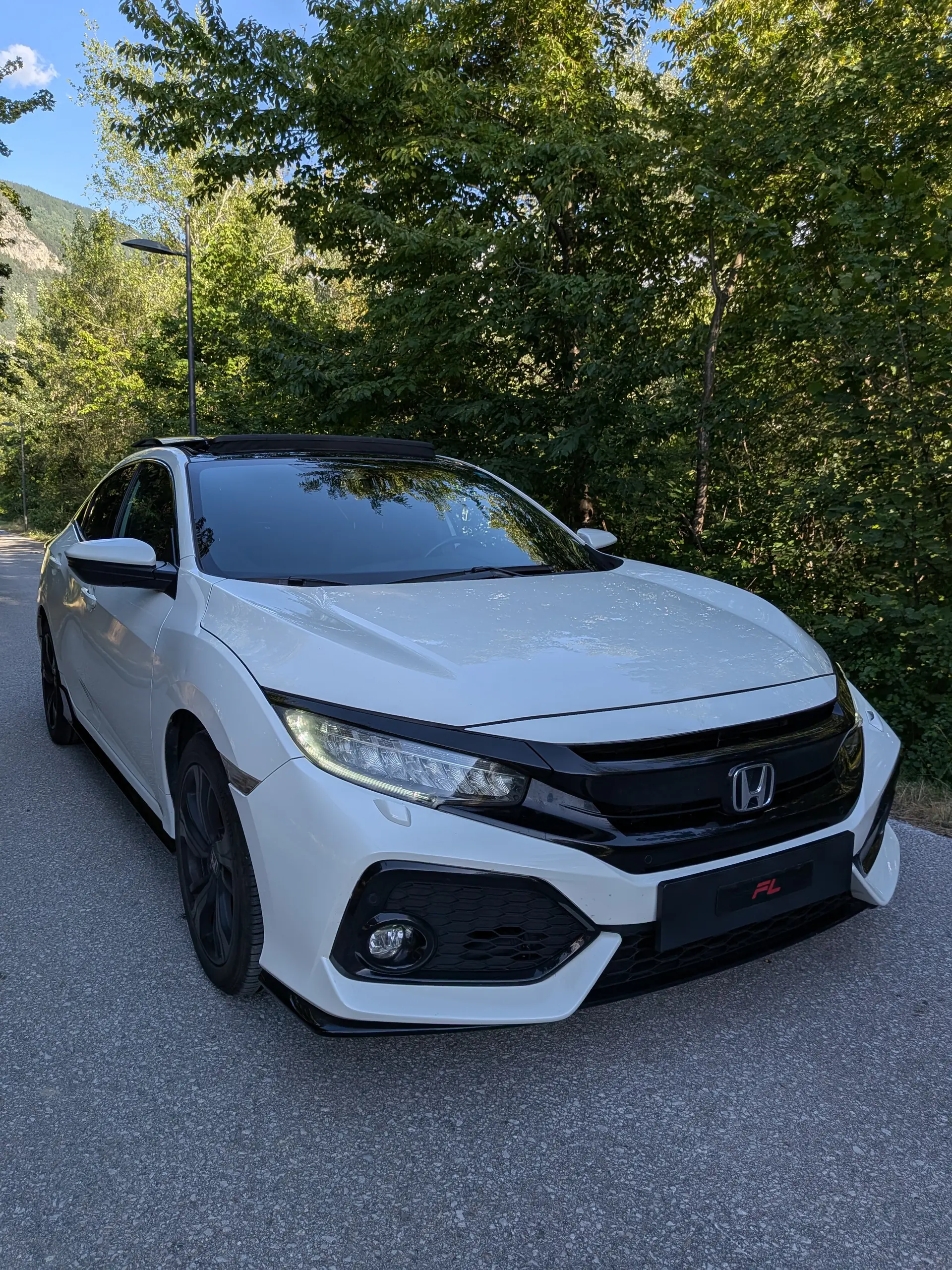 Honda Civic 1.5 Sport Plus Turbo VTEC — Berline sportive 182ch, révisions complètes 2026 — Außenansicht