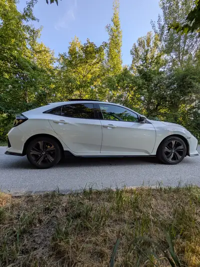 Honda Civic 1.5 Sport Plus Turbo VTEC — Berline sportive 182ch, révisions complètes 2026 — Heckansicht