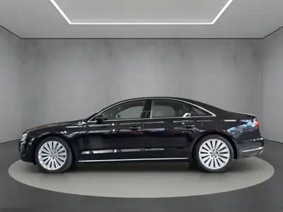 Audi A8 3.0 V6 TDI Quattro — Berline de prestige, toit panoramique et suspension pneumatique — side view