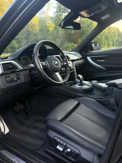 BMW 340i xDrive — Berline sportive premium, impeccable et fraîchement révisée — cruscotto