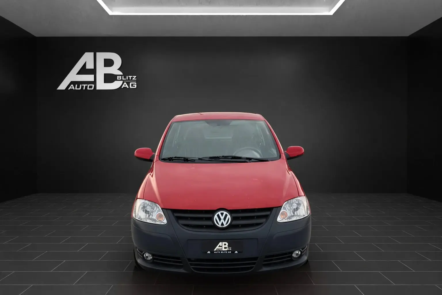 VW Fox 1.4 — Citadine pétillante rouge métallisée, entretien à jour