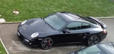 Porsche 911 3.8 Turbo — 500 ch de pure performance, kilométrage maîtrisé — Heckansicht