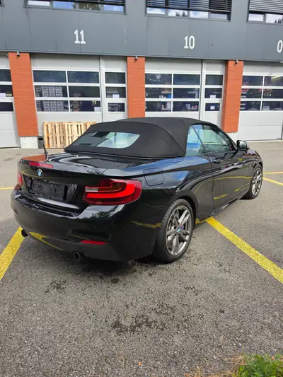 BMW M240i xDrive Cabriolet — Décapotable sportive 340 ch, essence automatique, 65'000 km — rear view