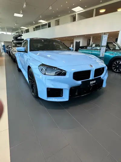 BMW M2 Coupé 2023 — 459 ch, design musclé et performances pures à très bas kilométrage — side view