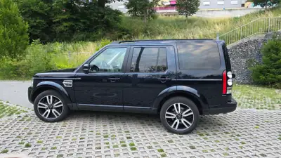 Land Rover Discovery 3.0 SDV6 256 — SUV 7 places robuste, 179'000 km — côté