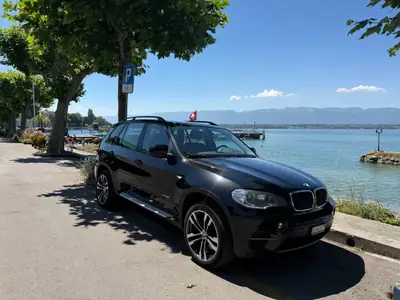 BMW X5 35i xDrive 2012 — SUV premium performant, sans sinistre — côté