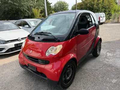 Smart Fortwo Pure 2003 — Citadine iconique, rouge métallisé, essence économique — vista esterna