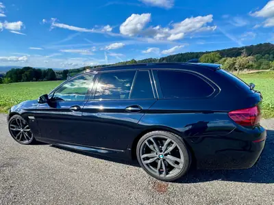 BMW M550d xDrive — Break sportif diesel, 381 ch et transmission intégrale — fianco