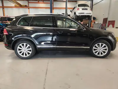 Volkswagen Touareg 3.0 V6 TDI 245 — SUV premium diesel, entretien soigné — côté