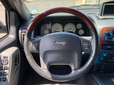 Jeep Grand Cherokee 4.7 Overland — SUV polyvalent, traction intégrale, sièges cuir chauffants — Miniature 13