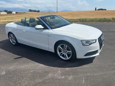 Audi A5 Cabriolet 2.0 TFSI Quattro — Élégance décapotable et performance all-wheel drive — Seitenansicht