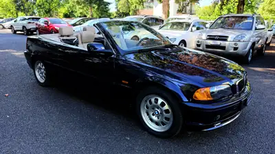 BMW 320Ci Cabriolet — Roadster élégant 2001, 170 ch et toit ouvert — Miniatur 9