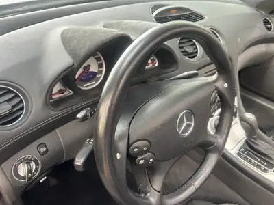 Mercedes-Benz SL 55 AMG — Cabriolet V8 légendaire, 500 ch de pure performance — Miniature 12