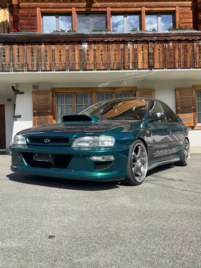Subaru Impreza 2.0 Turbo GT 1997 — Berline sportive de légende, 211 ch turbo et suspensions ajustables — exterior view