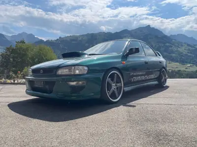 Subaru Impreza 2.0 Turbo GT 1997 — Berline sportive de légende, 211 ch turbo et suspensions ajustables — dashboard