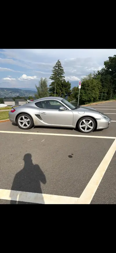 Porsche 718 Boxster 2.7 Tiptronic — Roadster légendaire, 23'000 km seulement — côté