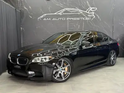 BMW M5 Competition Drivelogic — Berline musclée 575 ch, échappement titane et freins céramiques — vista esterna